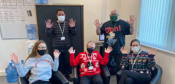 Biocair UK team dresses up for Christmas Jumper Day.