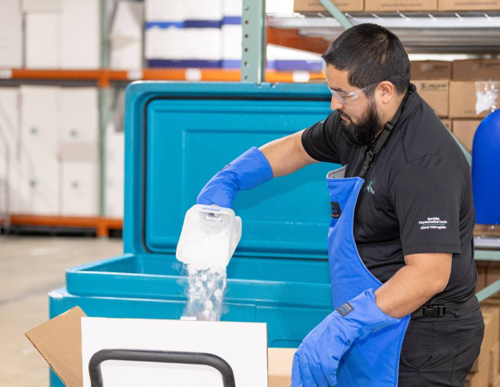 Biocair employee pouring ice