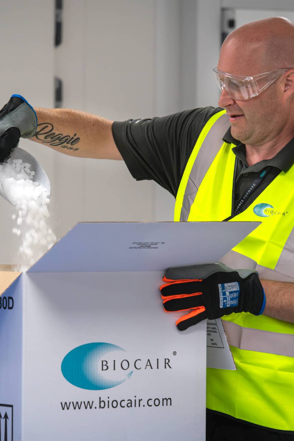 Biocair employee with box and dry ice