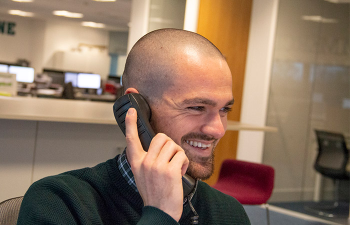 male colleague on the phone in office