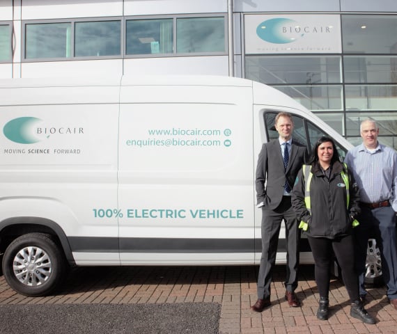 Colleagues with Biocair Van